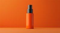 Orange cosmetic spray bottle on matching orange background with minimalist composition and soft shadow creates modern product presentation for beauty industry.
