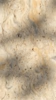 Natural travertine stone surface with organic patterns and earth tones for luxury interior design and architectural applications.