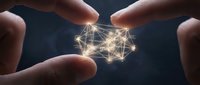 Hands holding glowing digital network sphere with interconnected light nodes, representing data connection, technology innovation, and global communication concepts.