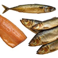 Smoked fish assortment including whole mackerel, salmon fillet and sardines isolated on white background for food packaging and culinary design.
