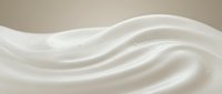 Smooth white cream or lotion with flowing wave texture, suitable for cosmetics, skincare, beauty product packaging, and wellness advertising.