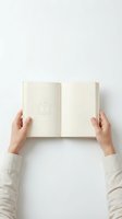 Hands holding open blank notebook with embossed book icon on white background, minimalist mockup for branding, education, and publishing design.