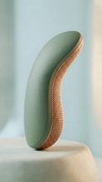 Curved sage green wellness device with woven terracotta mesh texture detail, isolated on neutral background for product design, wellness marketing, and lifestyle applications.