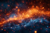 Abstract cosmic background with glowing orange and blue bokeh lights creating magical space atmosphere. Dreamy galaxy effect with blurred particles.