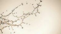 Dynamic water splash with droplets and bubbles captured in motion against neutral beige background for refreshing beverage and hydration concepts.