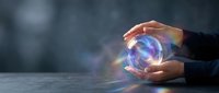 Hands holding glowing crystal ball with colorful light energy, mystical fortune telling and divination concept for spiritual guidance and future prediction.