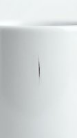 Minimalist monochromatic composition featuring a single thin dark line on white paper, creating stark contrast and negative space for contemporary design and artistic projects.