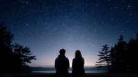 Romantic couple silhouettes watching starry night sky at dawn with pine trees, peaceful moment together under stars for love and relationship concepts.