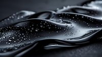 Abstract black liquid surface with water droplets creating dynamic waves and reflections, perfect for luxury product advertising and modern design backgrounds.