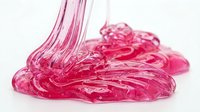 Bright pink slime stretches and flows across white background, creating glossy, translucent texture. Isolated design element suitable for creative projects and digital compositions.