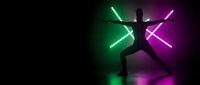 Silhouette of warrior holding glowing neon swords in combat pose against colorful lighting background for gaming and entertainment design.
