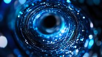 Glowing blue spiral tunnel with bokeh light effects and dark center creates futuristic technological vortex pattern against black background. Suitable for tech concepts.