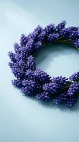 Fresh lavender wreath on soft blue background for spring home decor and aromatherapy relaxation.