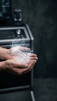 Male hands holding glowing digital energy sphere with light trails in modern tech environment for innovation and technology concepts.