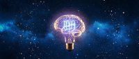 Glowing brain lightbulb with neural networks against starry space background representing artificial intelligence, innovation and creative thinking concepts.