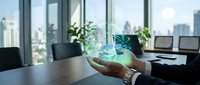 Businessman holding glowing digital hologram with data visualization in modern office with city skyline view, representing technology innovation and business analytics.