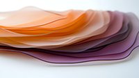 Layered translucent shapes in orange and purple gradient create abstract waves with soft flowing curves, suitable for modern minimalist design backgrounds.
