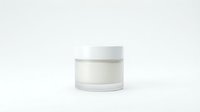 Minimalist white cosmetic cream jar with lid on a clean light background, showcasing elegant skincare packaging for beauty product branding.