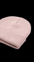 Pink knit beanie hat isolated on transparent background, cut out and ready for fashion design, stickers, print on demand, sublimation, and t-shirt design use.