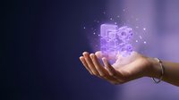 Businessman hand holding glowing digital gears and cogs hologram, representing technology innovation, automation, and industrial solutions for business operations.