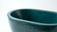 Weathered teal ceramic bowl with worn patina and distressed finish, suitable for home decor, styling, and product photography.