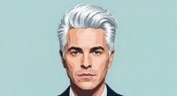 Mature man with silver hair and facial hair wearing dark business suit against light blue background, professional portrait.