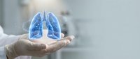 Medical professional holding holographic lungs model showcasing respiratory health technology for healthcare education and pulmonology presentations.