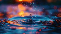 Mesmerizing macro water drops creating crown splash effect with orange and blue color contrast, bokeh lights in background for artistic nature photography.