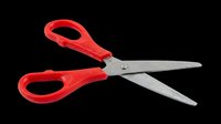 Scissors with red handles and sharp metal blades isolated on transparent background, ready for clipart, t-shirt design, print-on-demand products, stickers, and sublimation projects.