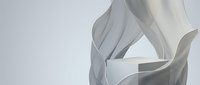 Elegant white silk fabric flowing gracefully with soft folds and curves against neutral background for luxury fashion and textile design projects.