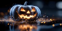 Glowing carved pumpkin with spooky face illuminated at night, surrounded by magical sparkles and mist creating mysterious Halloween atmosphere with bokeh reflections.
