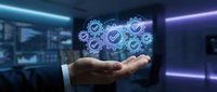 Businessman hand holding glowing gears with checkmark symbol, representing digital workflow, process automation, and technology solutions for business operations.