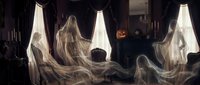 Spooky Halloween ghosts floating in haunted house interior with carved pumpkin and candlelight creating eerie atmospheric scene for horror themed designs.