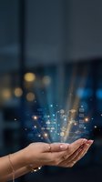 Female hands cupped presenting glowing digital network icons and connections floating above palms in modern office environment for technology concepts.