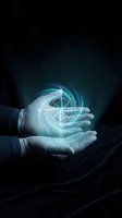 Hands holding glowing compass hologram with navigation directions in dark atmospheric setting for business guidance and leadership concepts.