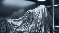 Draped metallic fabric with flowing folds catches dramatic lighting, creating elegant waves and shadows. Suitable for luxury fashion, textile design, and contemporary art projects.