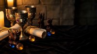 Medieval fantasy tavern scene with ornate golden goblets, ancient scrolls and flickering candles creating atmospheric lighting for gaming and storytelling.