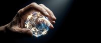 Male hand holding glowing digital globe network sphere against dark background, representing global connectivity, technology innovation, and worldwide business communication.