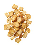 Crispy seasoned croutons isolated on white background, ready for salad toppings, soups, and culinary design projects.