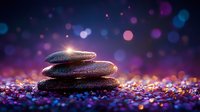 Zen stones stacked on glitter surface with purple and blue bokeh lights in dark background creating magical spa atmosphere for wellness and meditation.