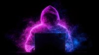 Glowing silhouette of person working on laptop with vibrant pink and blue ethereal smoke effect against dark background, representing digital transformation and remote work.