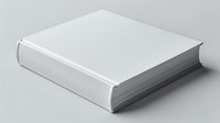 White blank hardcover book with dust jacket isolated on gray background for mockup and design projects.