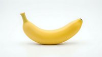 Fresh yellow banana isolated on white background, ready for food and nutrition design projects.
