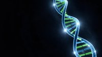 Glowing DNA double helix structure with blue and green colors on dark background for genetic research and biotechnology concepts.