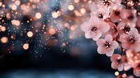 Cherry blossom flowers with sparkling bokeh lights and magical glowing particles creating dreamy spring atmosphere for romantic designs and celebrations.