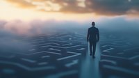 Silhouette of businessman walking through glowing digital maze pattern against dramatic sky, representing journey through technological challenges and solutions.