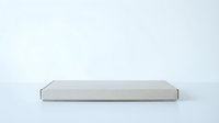 Minimalist gray rectangular platform or podium on white background, isolated product display stand for showcasing merchandise, cosmetics, or goods.