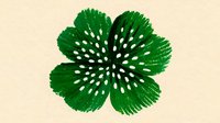 Vibrant green four-leaf clover with white spotted pattern on beige background, symbolizing luck and fortune for greeting cards and seasonal designs.
