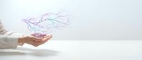 Business professional hands releasing colorful flowing lines representing data transfer, innovation and digital transformation concepts for presentations.