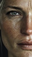 Close-up portrait of Caucasian woman with freckles, blue eyes, and natural skin texture showing authentic beauty for skincare advertising.